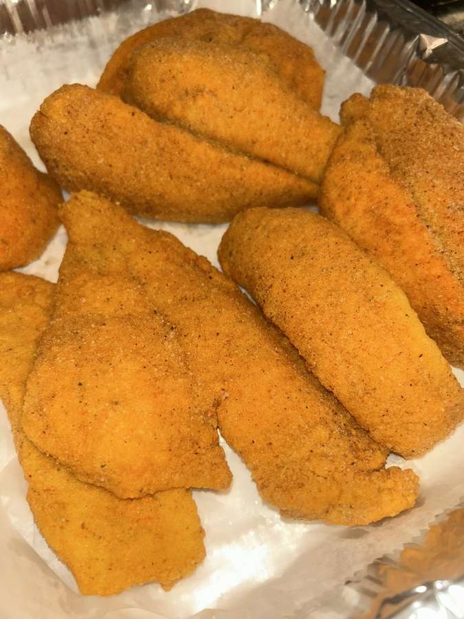 Freshly fried golden fish fillets