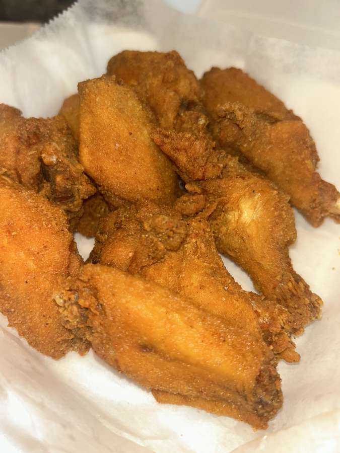 Crispy golden fried chicken wings